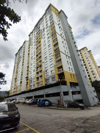 Tall yellow and white block at Taman Jasa Perwira, Gombak, with parking area