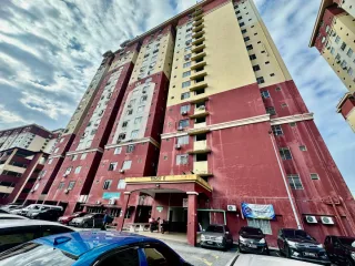 Tower E exterior of Mentari Court PJS 8 with red and cream facade
