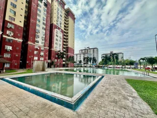 Swimming pool and tower blocks at Mentari Court PJS 8, Petaling Jaya