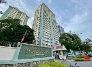 Main entrance signboard and towers of Kondominium Danau Idaman