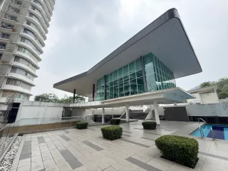 Clubhouse with glass facade and pool at Taman Bucida Hijauan, Seremban