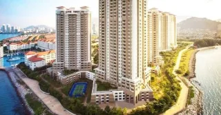 Quayside Condo towers and tennis court by the Penang coastline