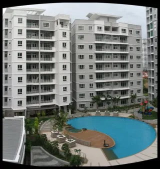 Swimming pool and residential blocks at The Ideal Regency, Timur Laut