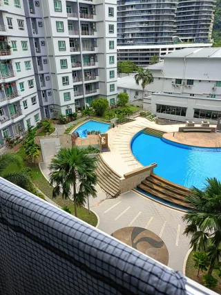 Swimming pool and residential blocks at The Ideal Regency, Timur Laut
