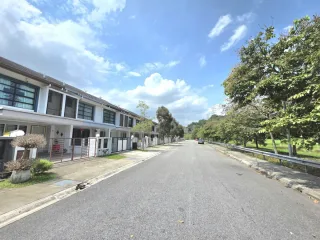 Row of 2-storey terrace houses along a quiet street in Bandar Bukit Raja