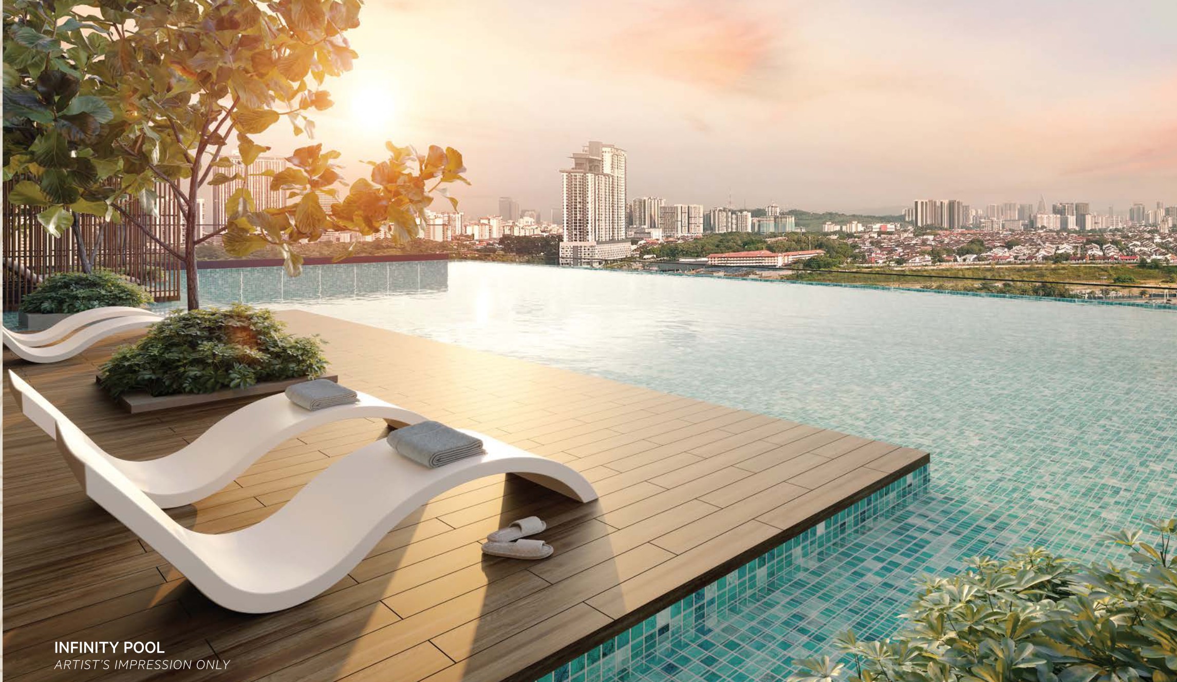 The infinity pool on the Level 5 deck, its edge turned towards the Klang Valley skyline