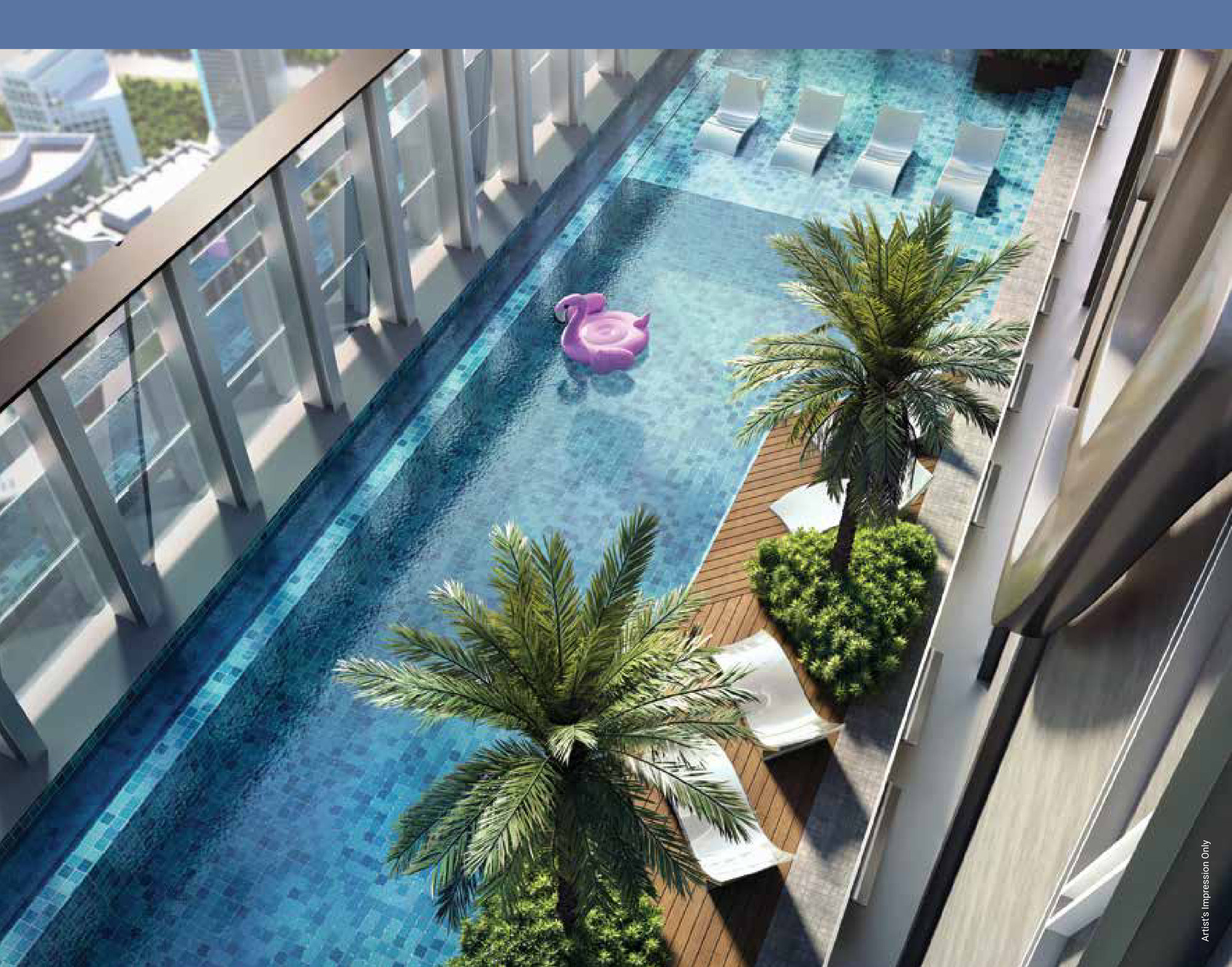 Tower 1, Level 77 — the swimming pool the brochure calls Malaysia's highest residential pool, looking down its full length with the sun deck, cabana planting and the city seventy-seven floors below